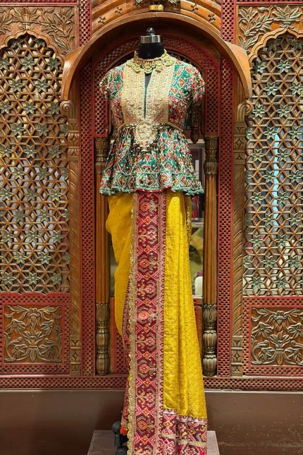 Mustrad highlighted Patola Border Saree