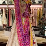 Purple Heavy Embroidered Patola Peplum with Ivory Kota Highlighted skirt with Patola Dupatta