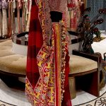 Maroon Patola Highlighted Heavy Tassels Saree with Maroon Embroidered Blouse