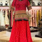 Fuchsia Pink Patola Embroidered Side Tassel Short Kurta with Red Bandhani Skirt