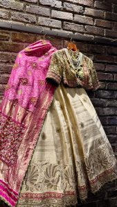 A bride arrives carrying more than a lehenga, she carries…